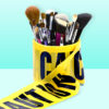 beauty products surrounded by caution tape