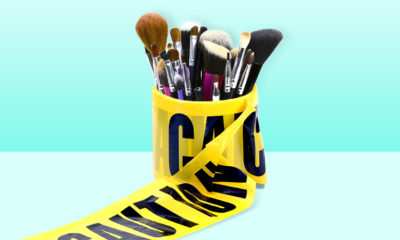 beauty products surrounded by caution tape