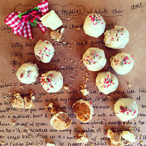 gingerbread cookie dough truffles on a piece of paper with the recipe