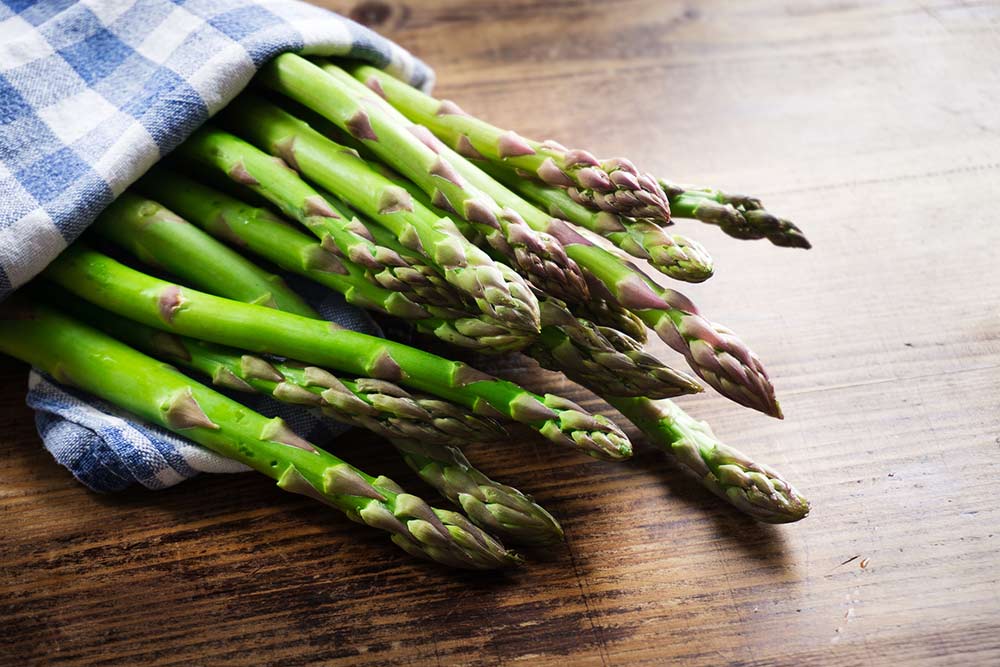 asparagus wrapped in a tea towel