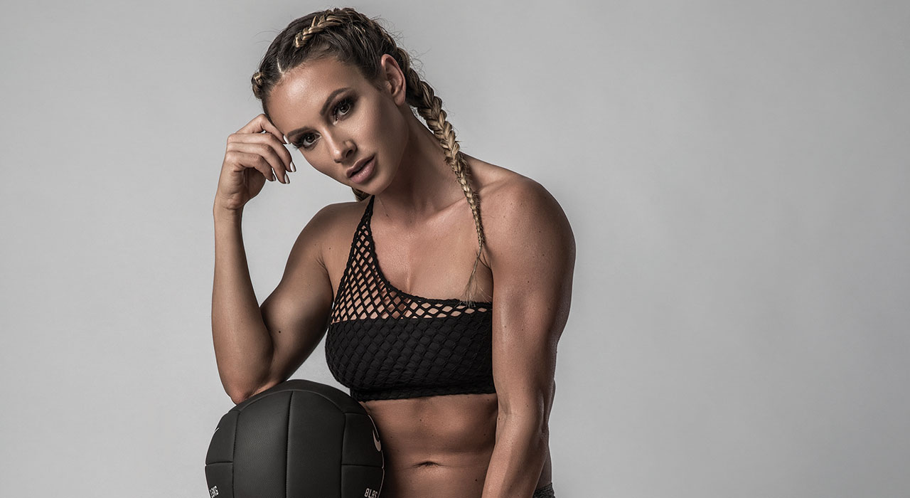 paige hathaway posing with a medicine ball