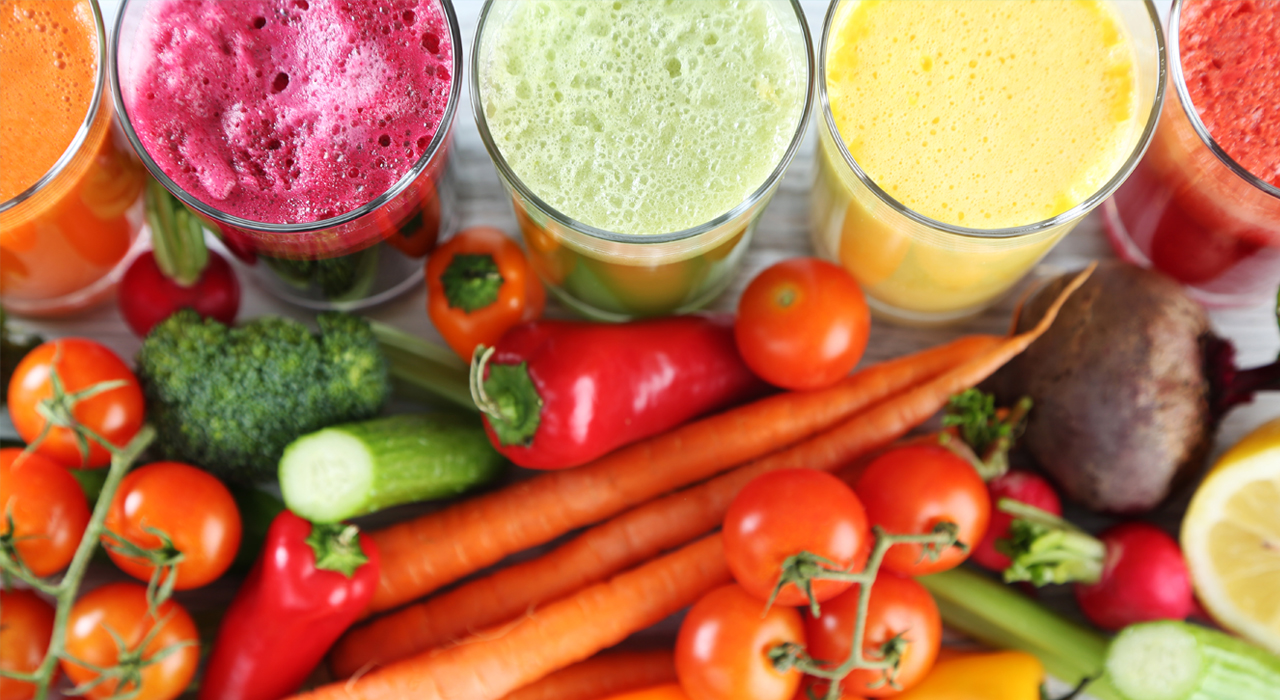 veggie smoothies next to vegetables