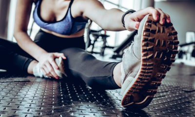 woman stretching in the gym