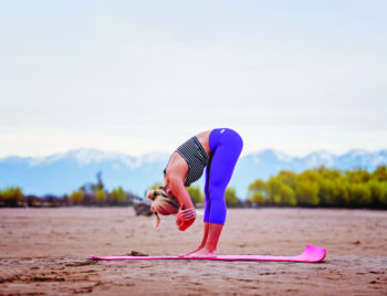 joy kushner performing yoga pose