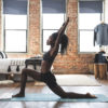 fit woman stretching in her home