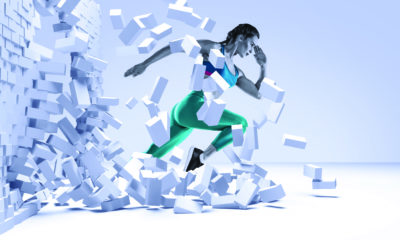 woman running through a wall