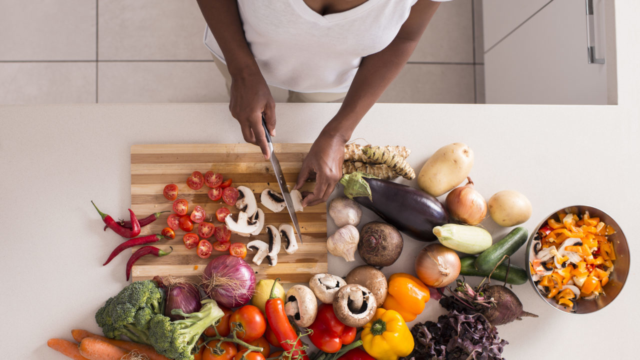 woman cutting vegetables