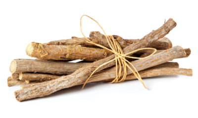 bunch of licorice roots tied with string