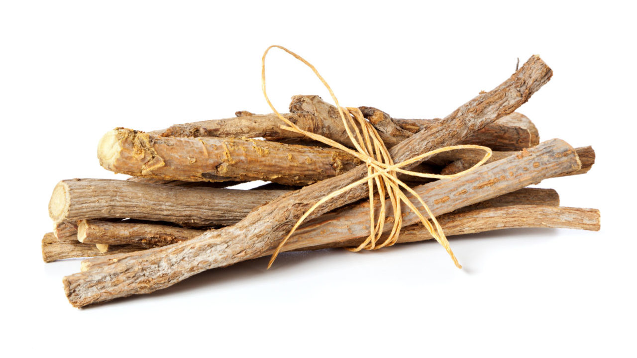 bunch of licorice roots tied with string