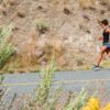 woman running on a outback road