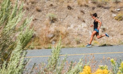 woman running on a outback road