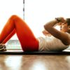 woman performing sit up